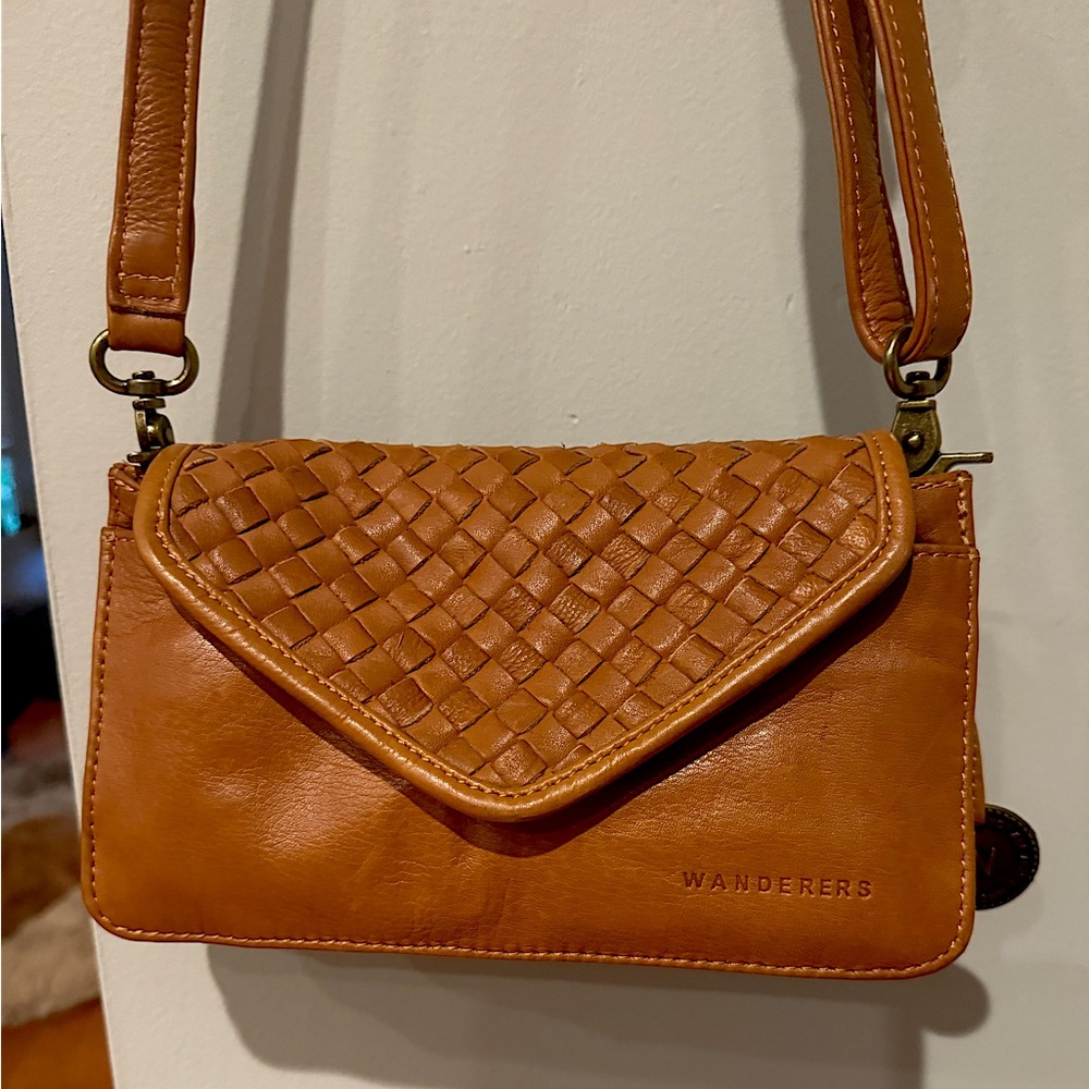 The Petite Marseille Woven Crossbody Wallet in tan. Barely used